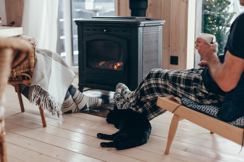 Family enjoying warm stove